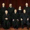 Group of judges in black robes.