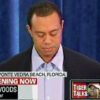 Man speaking at a press conference podium.