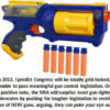 Toy Nerf gun with foam darts displayed.