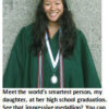 Graduate in green gown with medallion smiling.