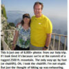 Couple at mountain summit in Italy.