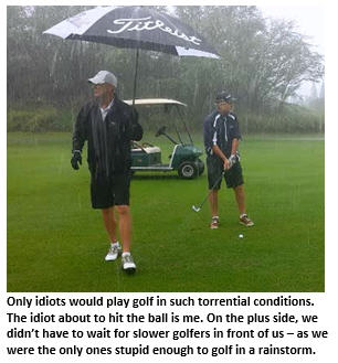 swingin in the rain - two golfers