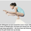 Young girl performing gymnastic balance pose.