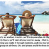 Couple relaxing on beach chairs by ocean.