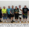 Group of men posing with squash rackets.