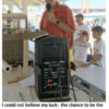Person announcing bingo at a fair.