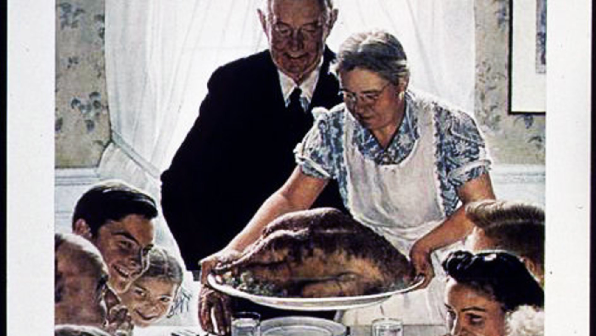 Ah, a traditional Thanksgiving dinner, where the wife does all the work and the husband just carves the bird, then watches football. But this year, our Thanksgiving was nothing like this scene. Not even close.