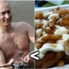Shirtless man and plate of poutine.