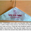 Clothes hanger with "Do Not Swallow" warning.