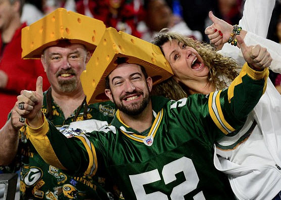 Sadly, some people don’t quite understand how cheese works. It is most effectively applied by ingesting it into your mouth. These men have not yet figured out that cheese worn atop one’s head will never make them happy – especially now that Aaron Rodgers has been traded to the Jets.