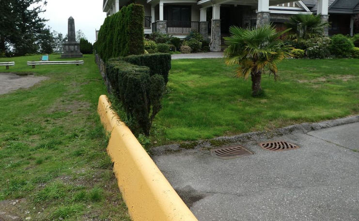 This is an actual photo of the border between Point Roberts, USA (left) and Tsawwassen, Canada (right). It is literally divided by just this ten-inch concrete barrier. Totally impenetrable – if you were a tortoise or a clam.