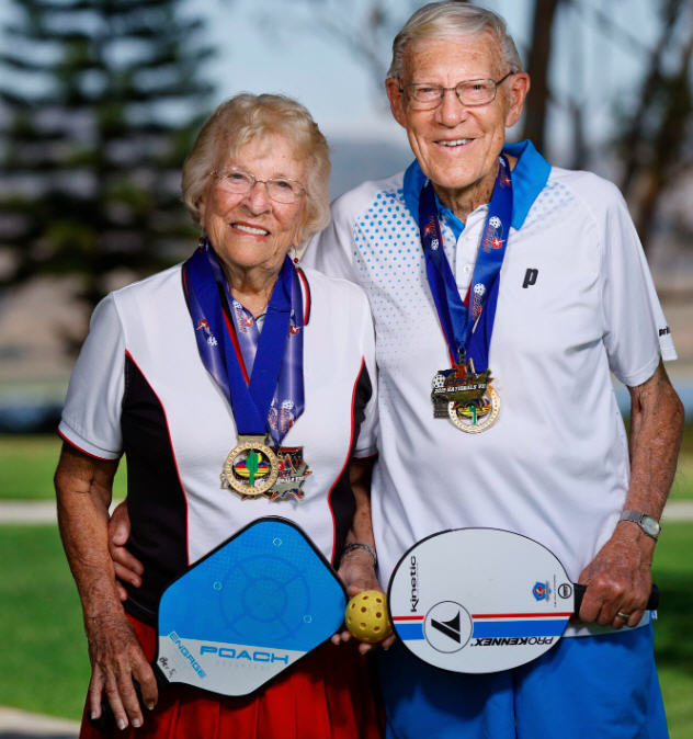 Check out this couple, Elsie and Art Claxton, proudly wearing their 1st place medals for their age group. Sadly, ever since a “friend” recruited them into this cult, it’s all they ever talk about. Ask Elsie about the weather and she’ll answer by explaining why you “can’t stand in the kitchen” – whatever that means. Their adult children are worried sick about them. Such a sad story.
