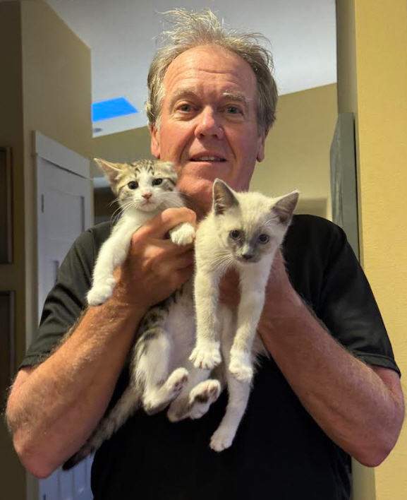 Here I am with the two latest additions to our fur family: Eddie and Dust Bunny. Our cats give us 60% of our daily laughs and giggles. The other 40% mostly comes from watching cat videos on YouTube.